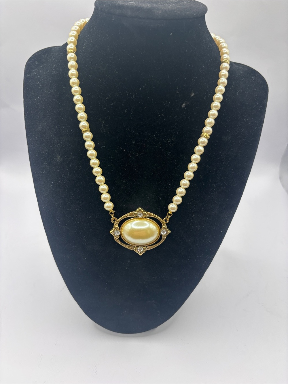 1928 Gold-Tone and Cream Pearl Necklace with Ornate Oval Focal